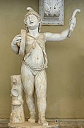 Roman sculpture of Attis, the consort of the Phrygian goddess Cybele wearing a Phrygian cap and performing a cult dance.